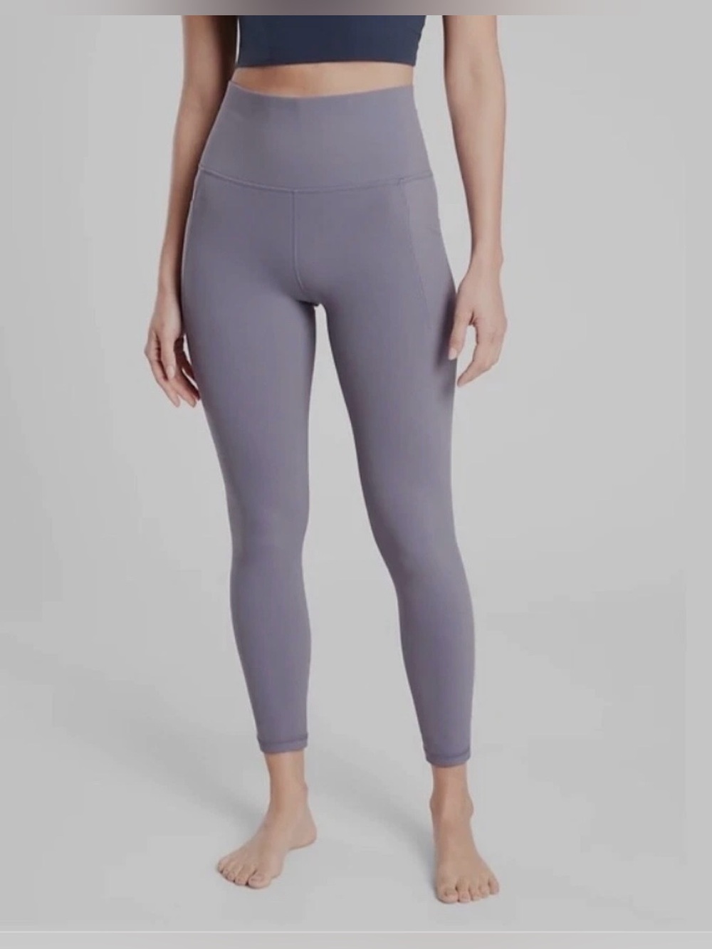 Athleta salutation stash 7/8 tight leggings XS lilac purple pockets high rise